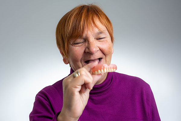 Adjusting to New Dentures: How to Deal With Loose Dentures from Carolina Smiles Family Dental in Brevard, NC